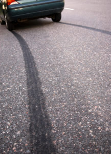 Tire print on asphalt road
