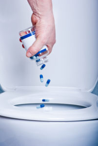 flushing pills down toilet