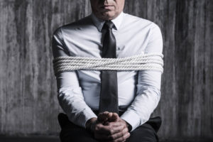person with rope around them being kidnapped