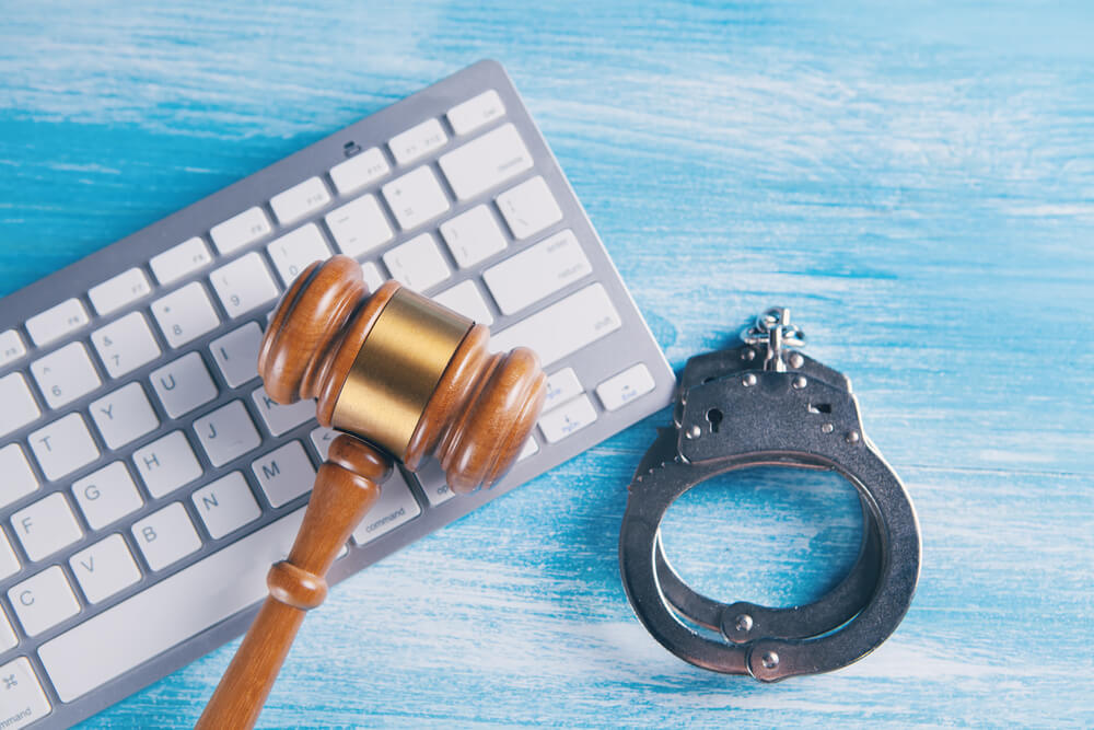 gavel keyboard handcuffs