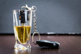 keys in shot glass