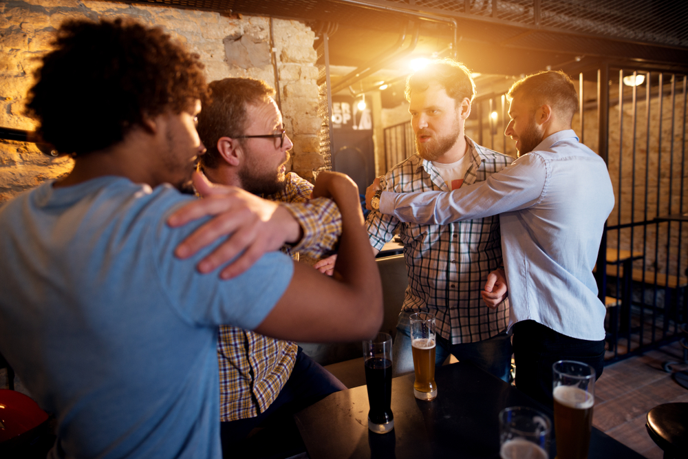 group of men engaged in an altercation