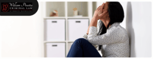 A woman victim of domestic violence crying in Newark